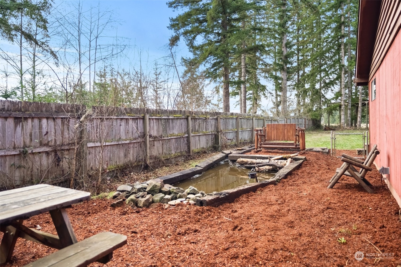 258 Coulson Road Chehalis, WA 98532 - Photo 29 of 37 a backyard of a house with barbeque oven