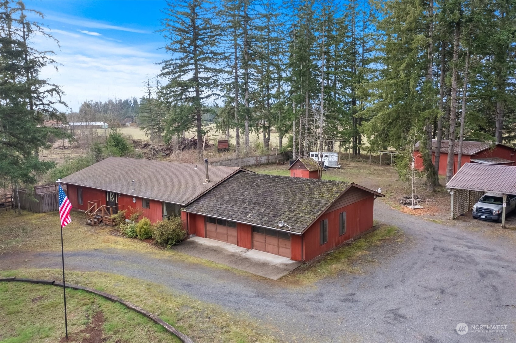 258 Coulson Road Chehalis, WA 98532 - Photo 32 of 37 a view of a house with a yard and sitting area