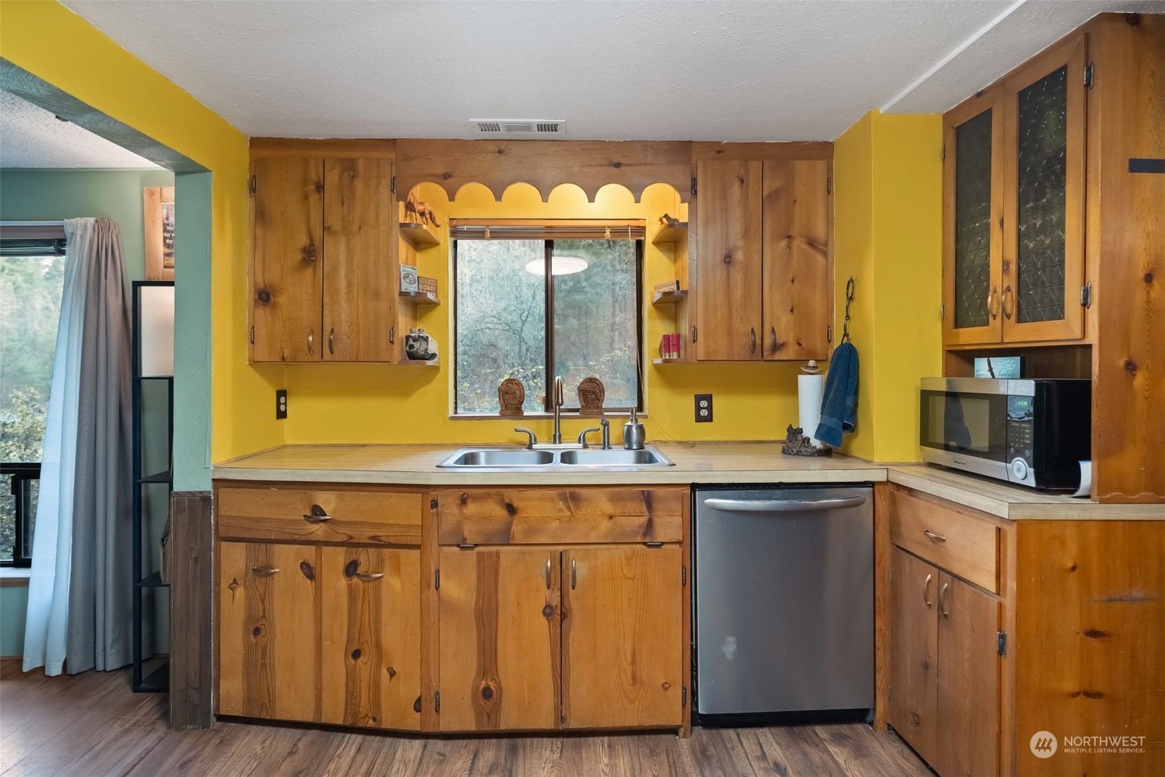 258 Coulson Road Chehalis, WA 98532 - Photo 10 of 37 a kitchen with stainless steel appliances granite countertop a sink and wooden cabinets