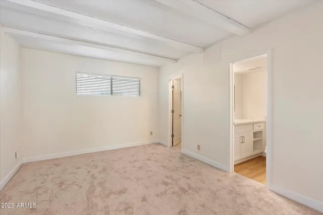 a bathroom with a sink vanity and mirror