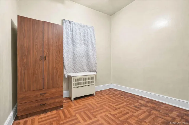 a view of room with stairs and a rug