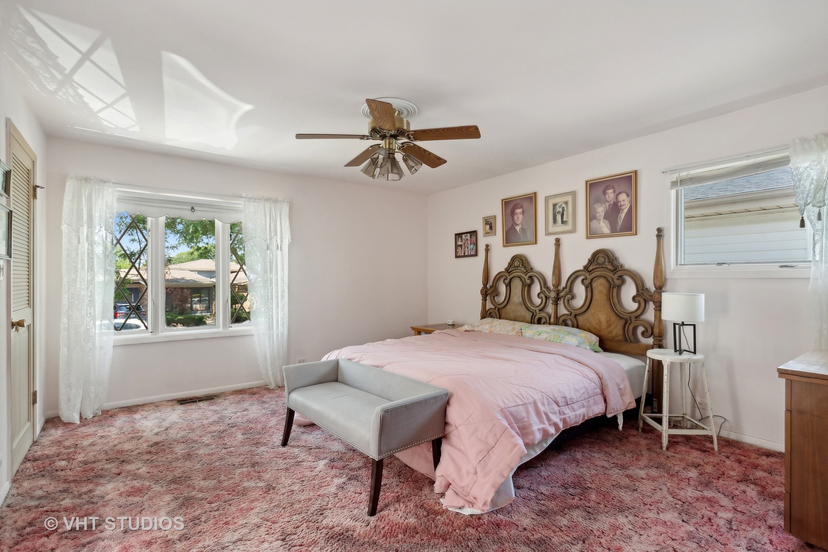 7957 Beckwith Road Morton Grove, IL 60053 - Photo 13 of 26 a bedroom with a bed and a chandelier