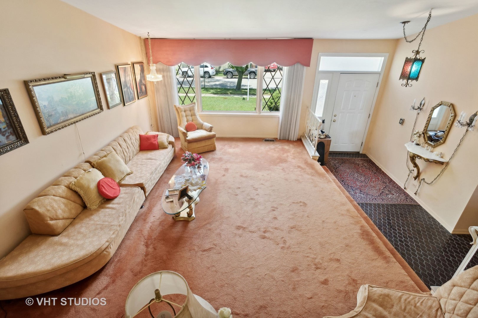 7957 Beckwith Road Morton Grove, IL 60053 - Photo 5 of 26 a living room with furniture and a large window