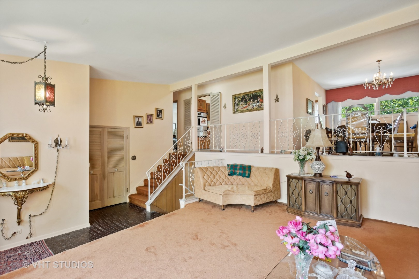 7957 Beckwith Road Morton Grove, IL 60053 - Photo 6 of 26 a living room with furniture and a chandelier
