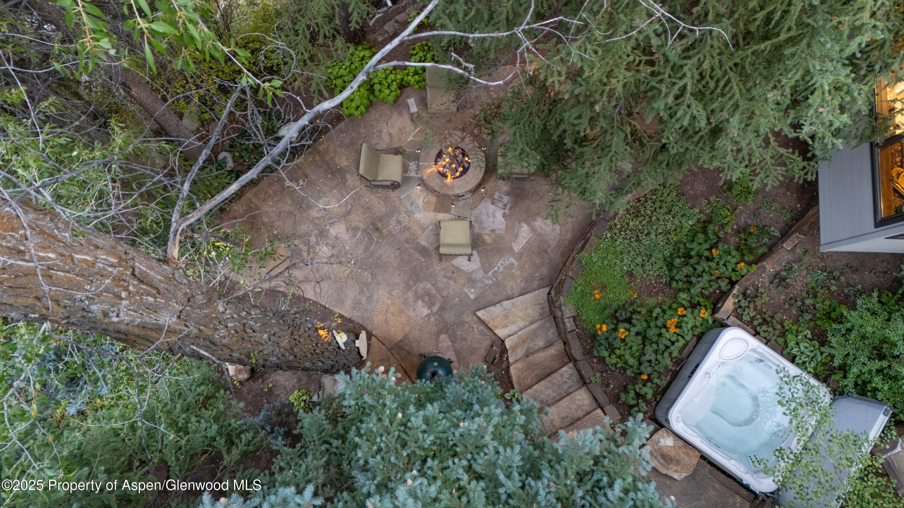 4076 Lower River Road Snowmass, CO 81654 - Photo 58 of 71 an aerial view of a house with garden space and street view