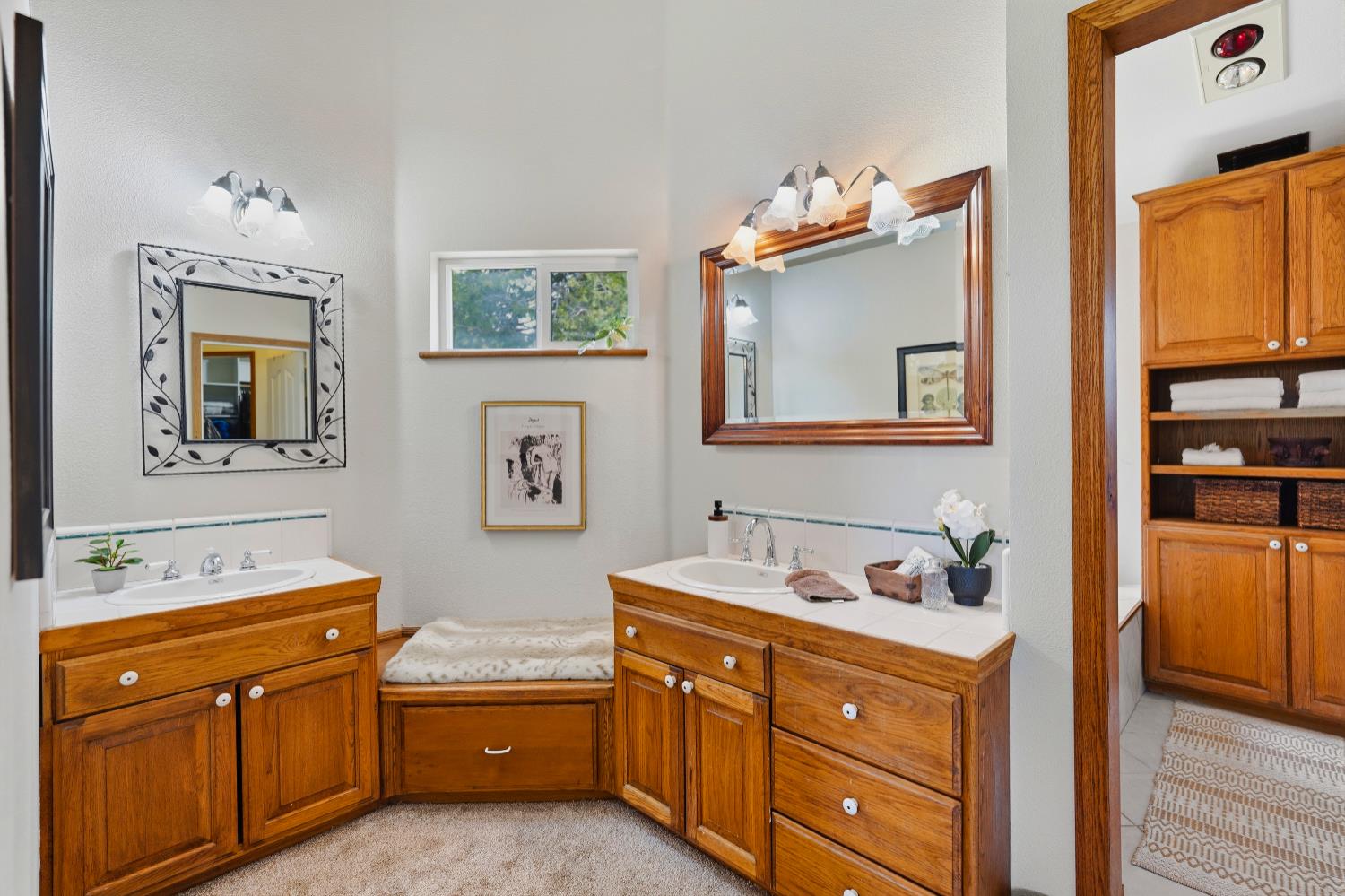 39000 Kearsarge Mill Road Alta, CA 95715 - Photo 27 of 65 a bathroom with a double vanity sink and a mirror