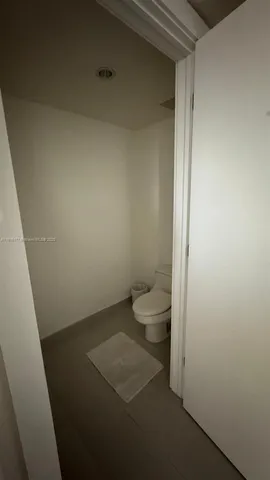 a bathroom with a toilet