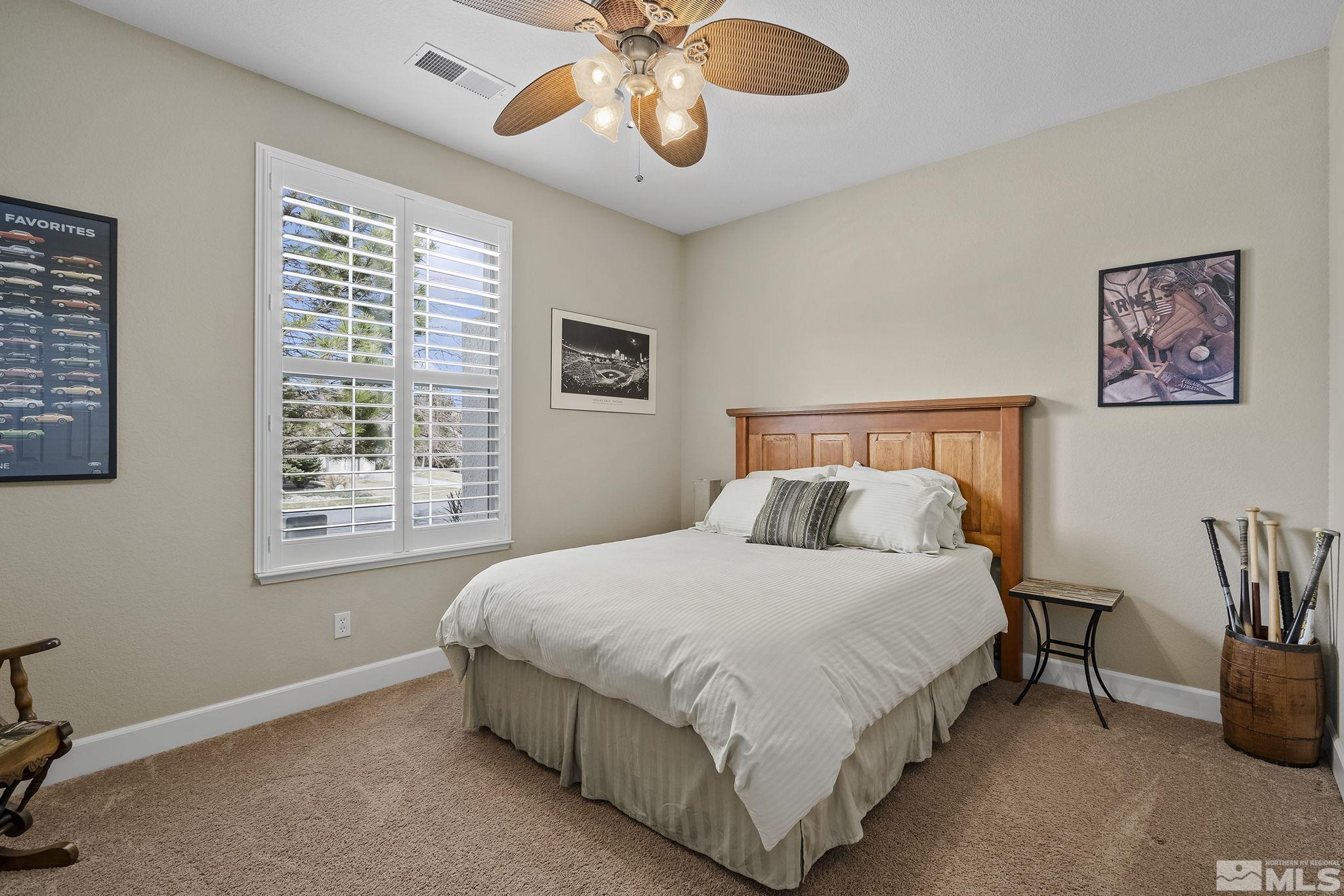 8180 Willow Ranch Trail Reno, NV 89523 - Photo 20 of 31 a bedroom with a bed and window