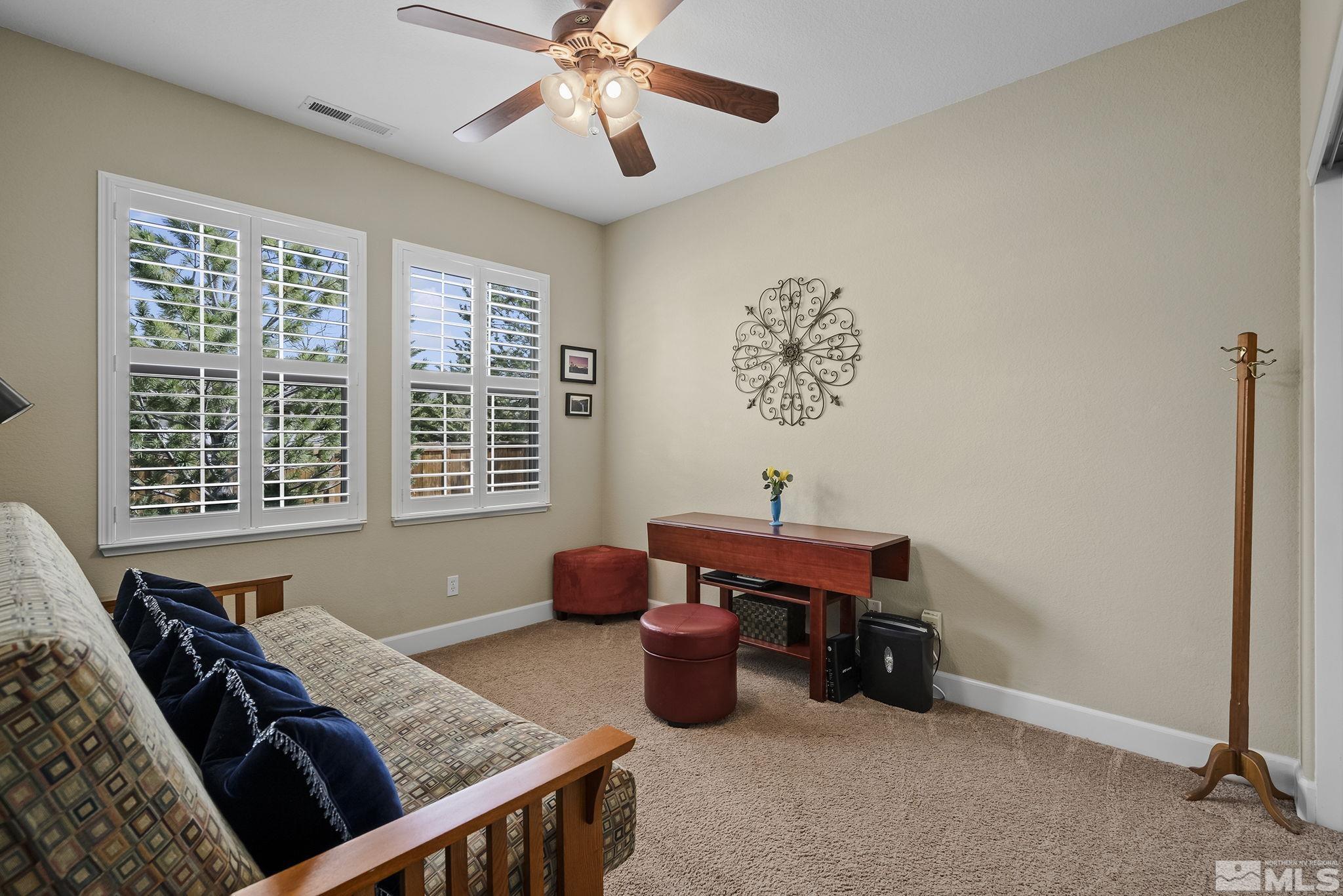 8180 Willow Ranch Trail Reno, NV 89523 - Photo 22 of 31 a room with furniture and window