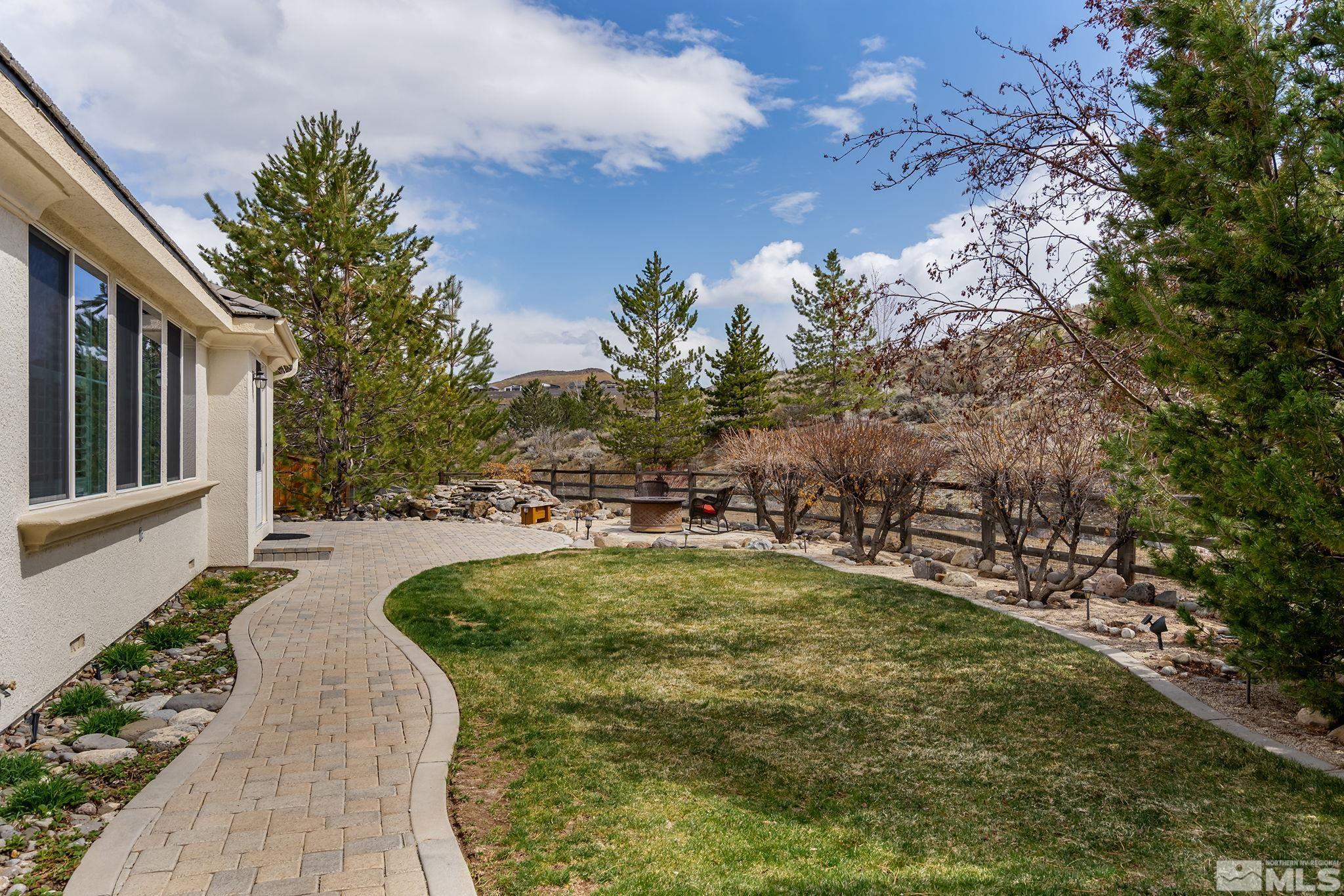 8180 Willow Ranch Trail Reno, NV 89523 - Photo 27 of 31 a view of swimming pool with outdoor seating