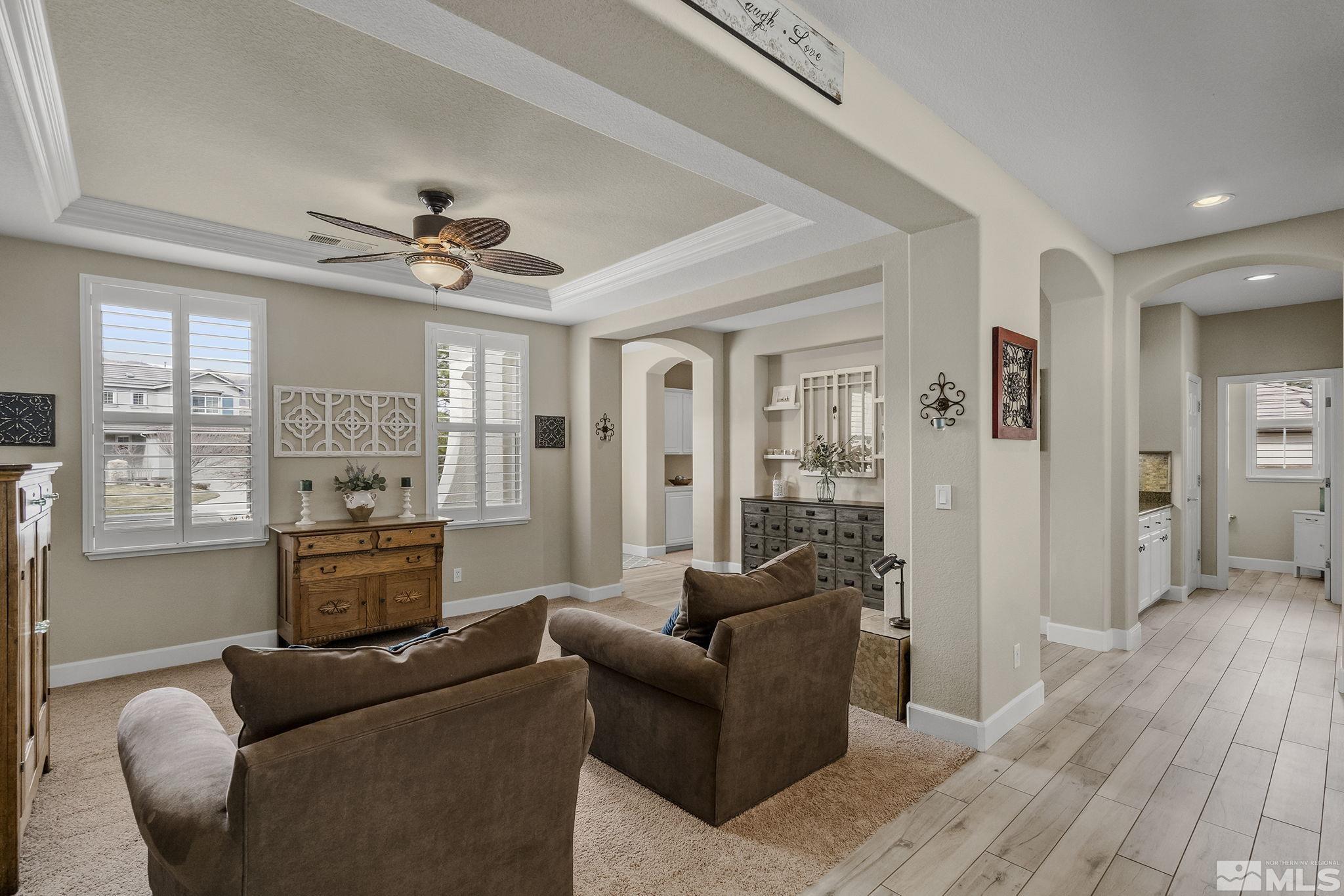 8180 Willow Ranch Trail Reno, NV 89523 - Photo 5 of 31 a living room with furniture and a fireplace