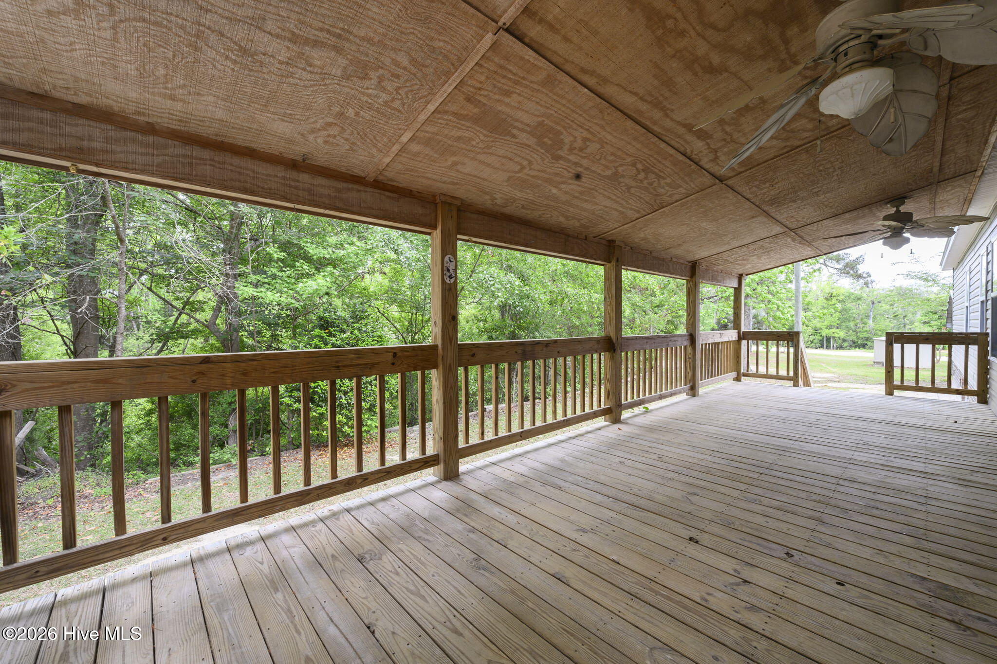 552 Colonial Landing Road Southeast Bolivia, NC 28422 - Photo 36 of 53 Covered Rear Porch
