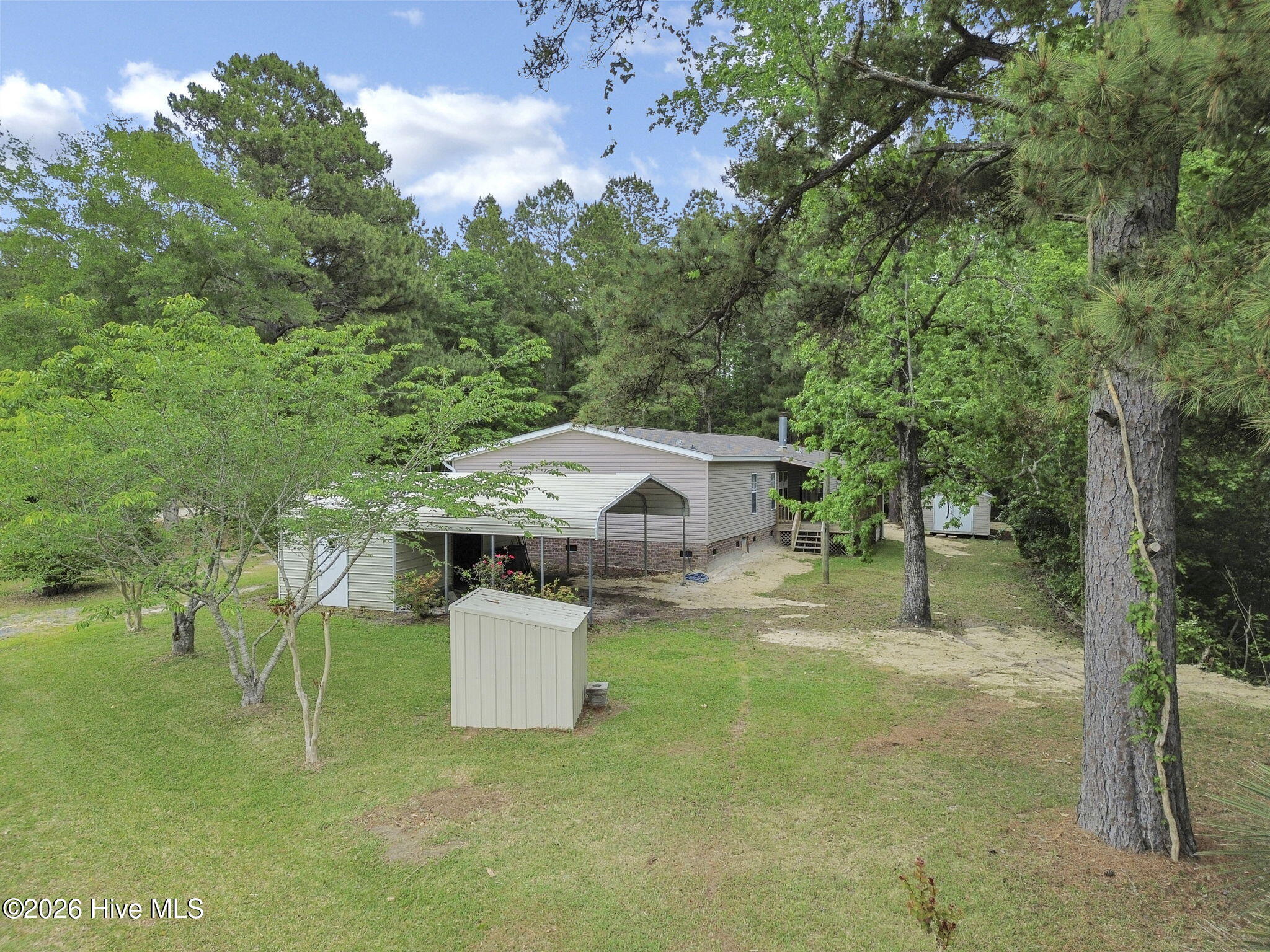 552 Colonial Landing Road Southeast Bolivia, NC 28422 - Photo 39 of 53 39-web-or-mls-Back yard aerial