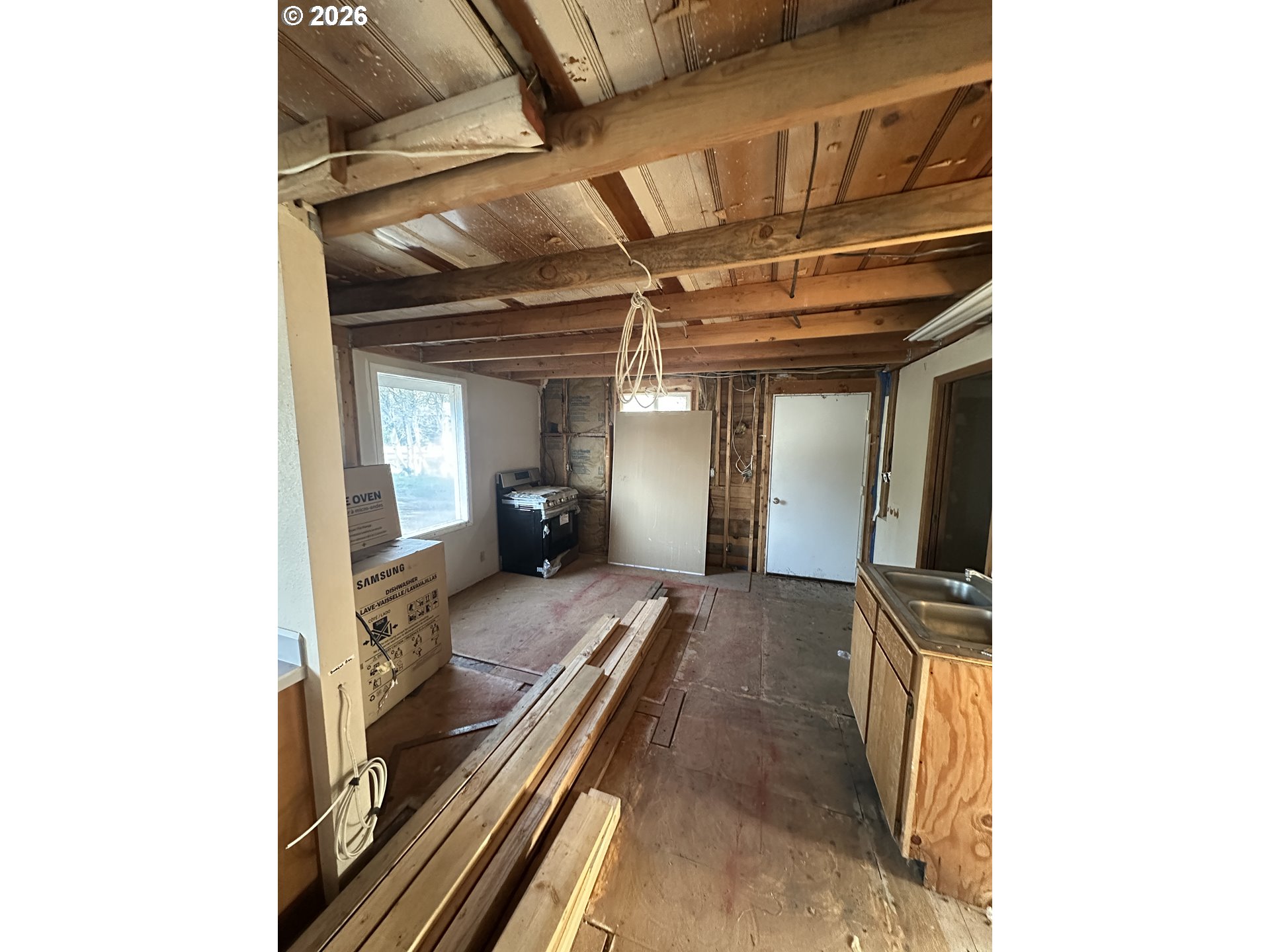 136863 Highway 97 Crescent, OR 97733 - Photo 5 of 19 a view of hallway with couch and wooden floor