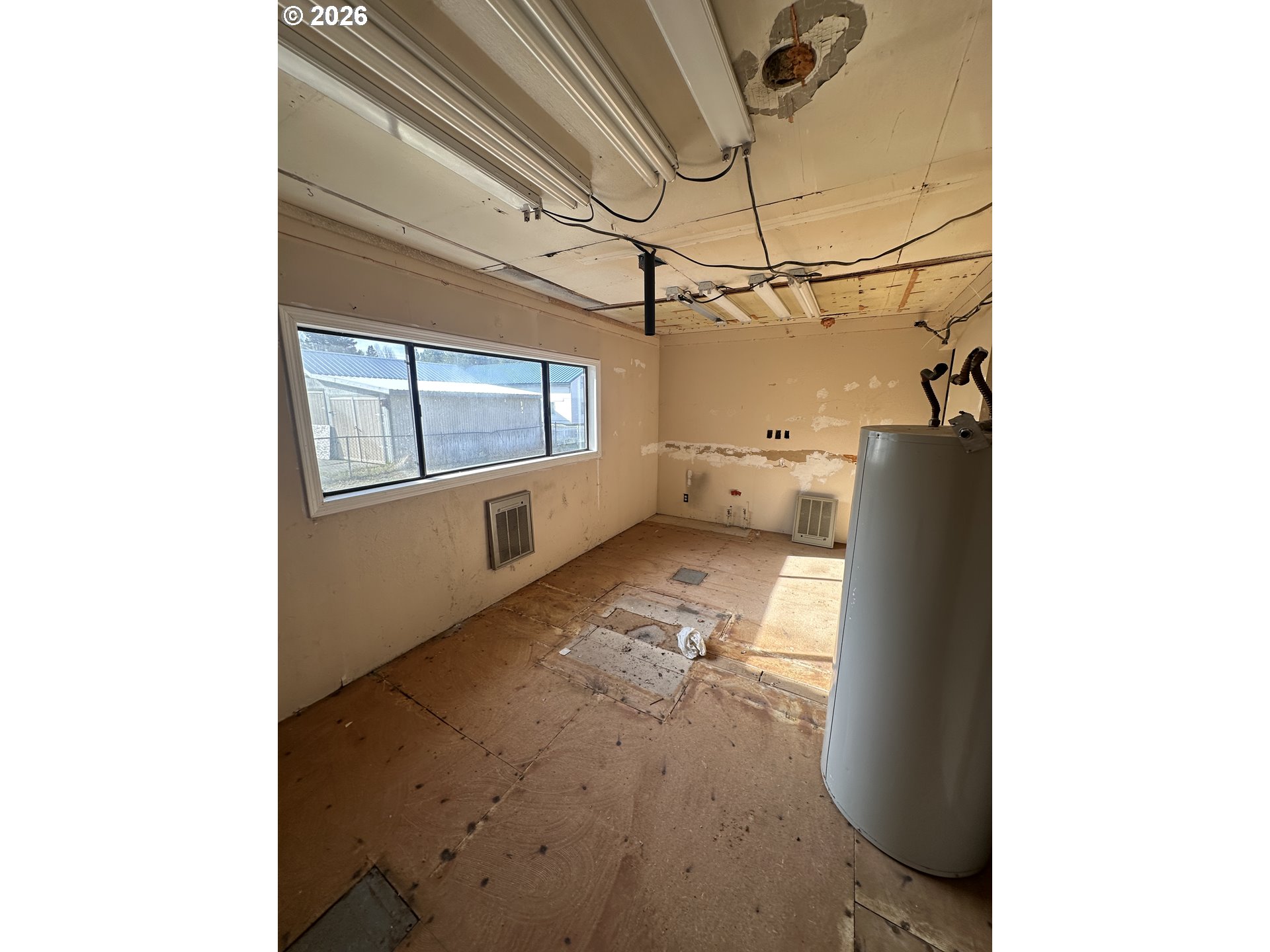 136863 Highway 97 Crescent, OR 97733 - Photo 10 of 19 a view of a living room with a wooden floor