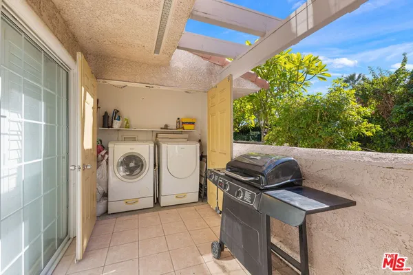 a kitchen with a stove and a microwave