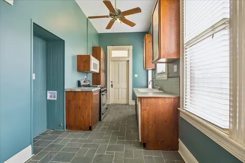 a view of a floor to ceiling window and wooden floor