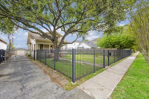 a view of a house with a street