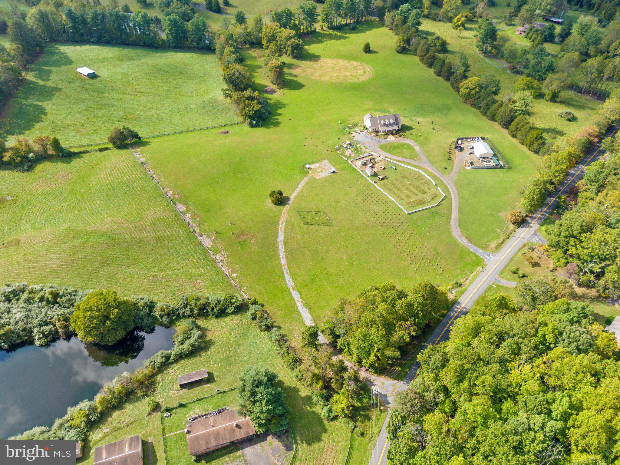 Wilson Road Marshall, VA 20115 - Photo 3 of 10 a view of a lake with a yard