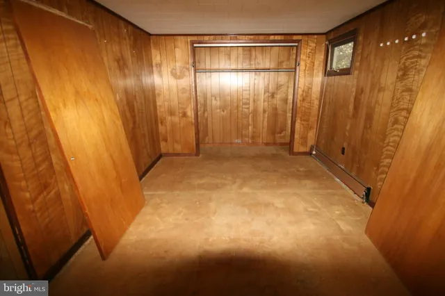 a view of empty room with windows