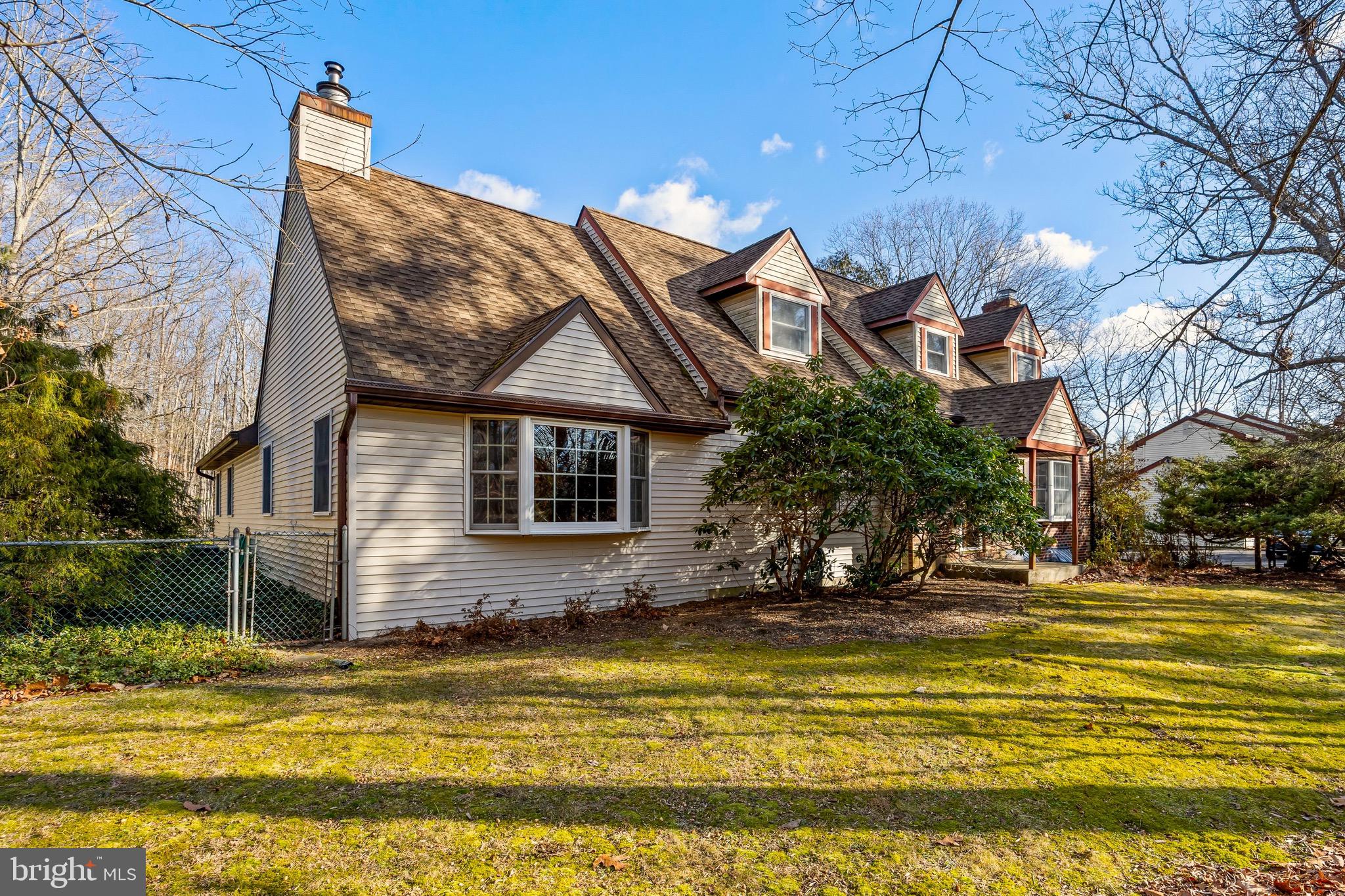 26 Tuckerton Road Shamong, NJ 08088 - Photo 2 of 44 a front view of a house with a yard table and chairs
