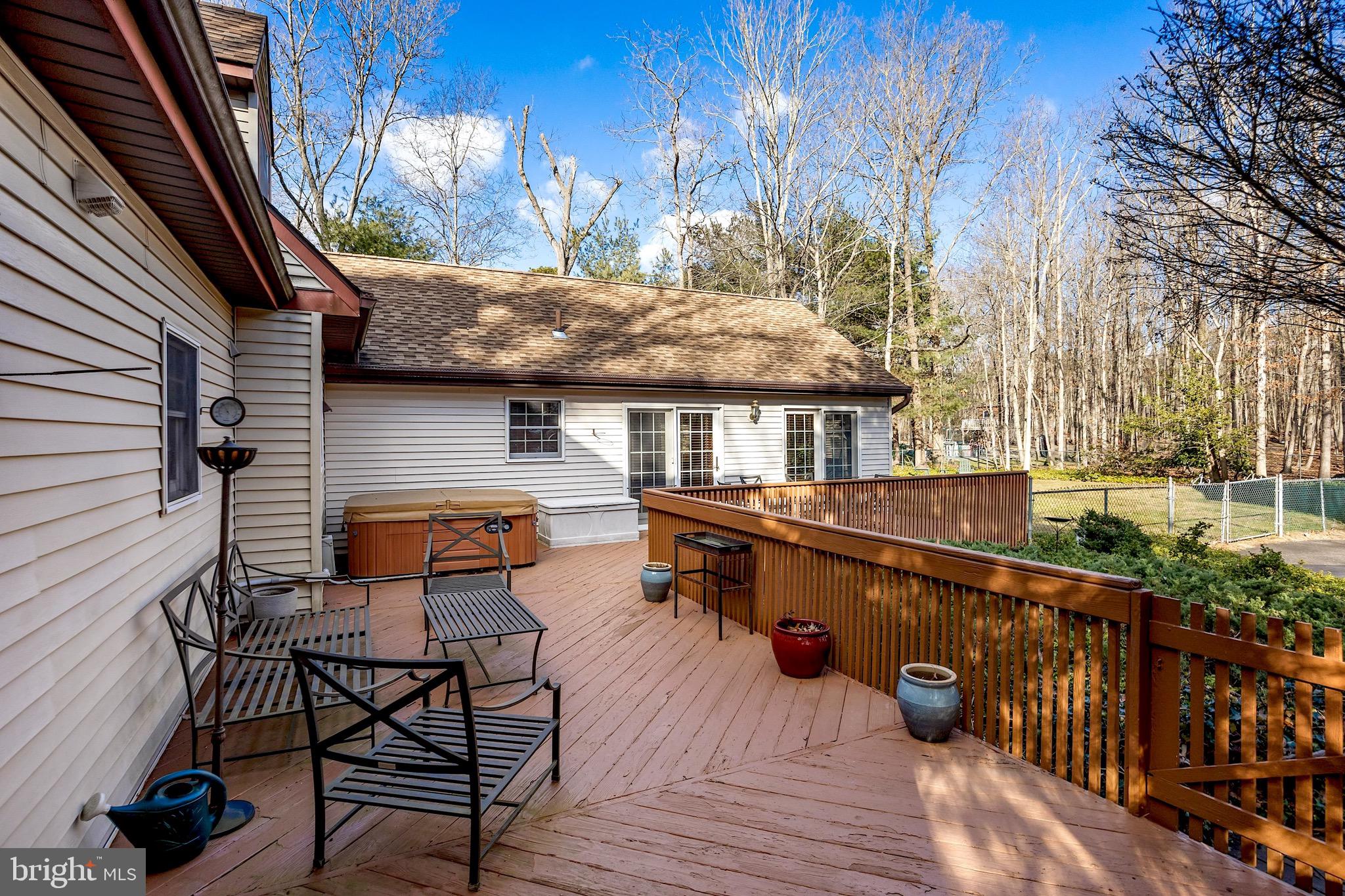 26 Tuckerton Road Shamong, NJ 08088 - Photo 31 of 44 a view of house with deck outdoor seating and barbeque