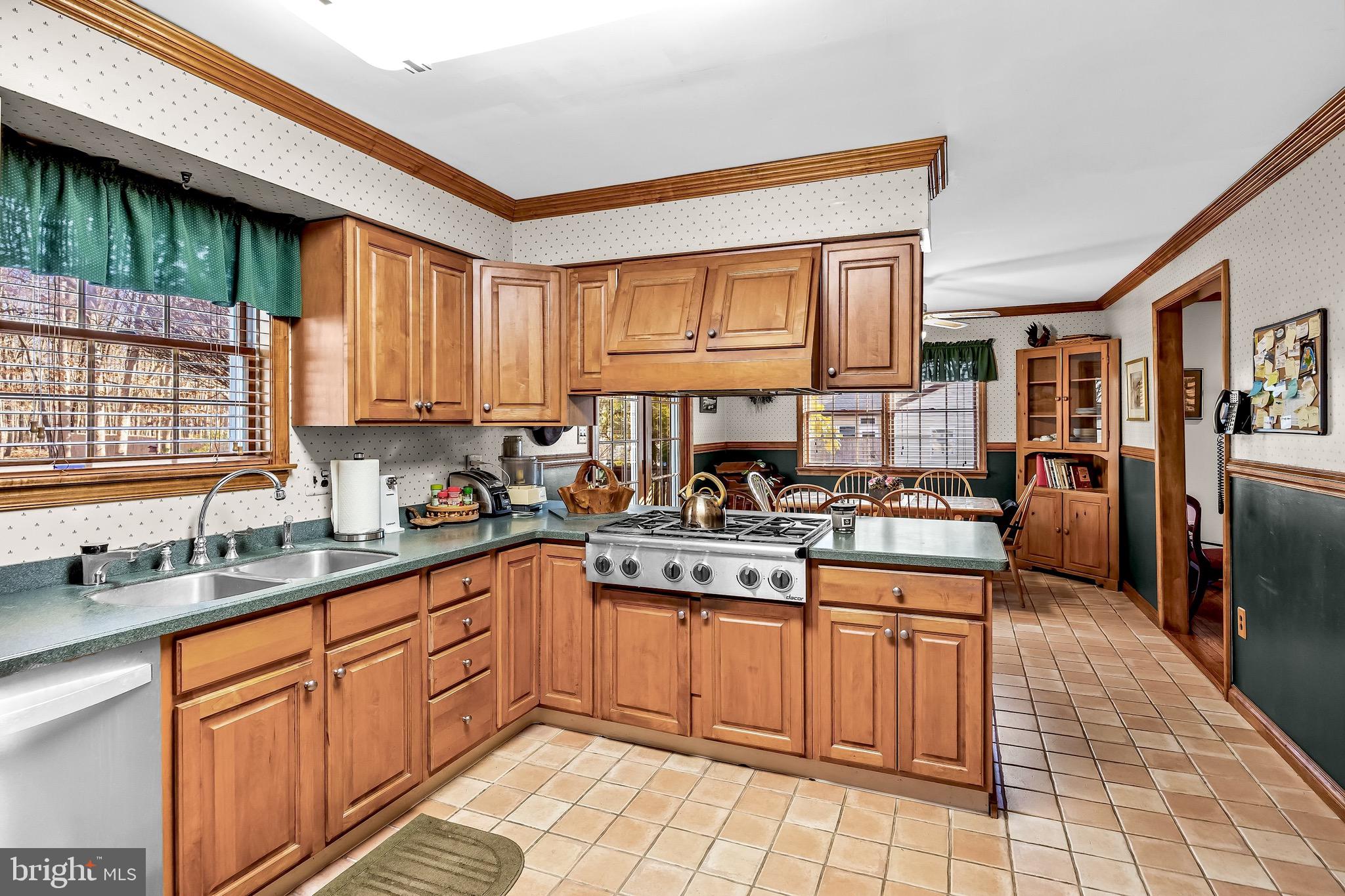 26 Tuckerton Road Shamong, NJ 08088 - Photo 7 of 44 a kitchen with stainless steel appliances granite countertop a stove a sink dishwasher and a refrigerator