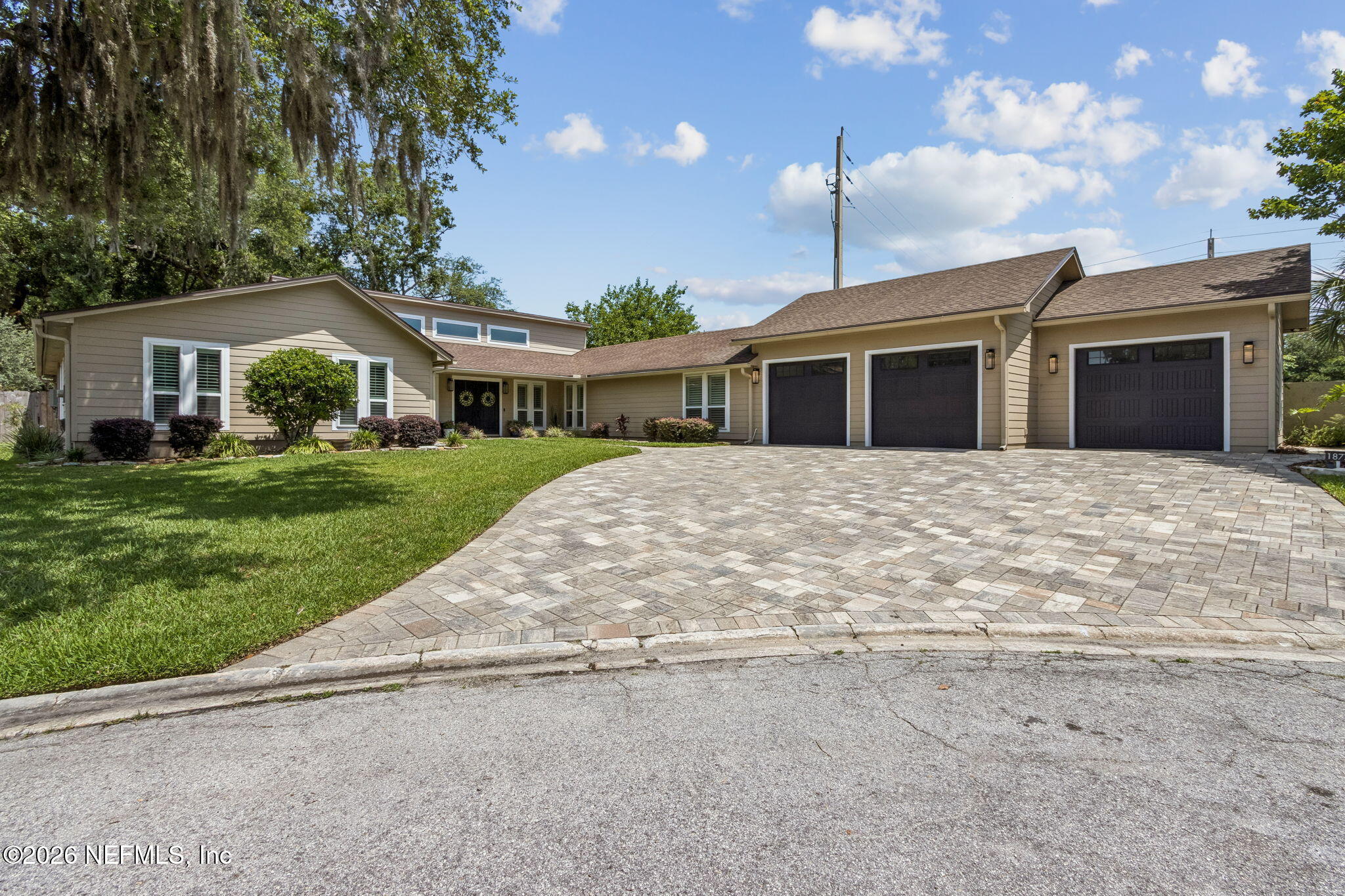 1877 Christopher Point Road South Jacksonville, FL 32217 - Photo 1 of 27 a front view of a house with a yard