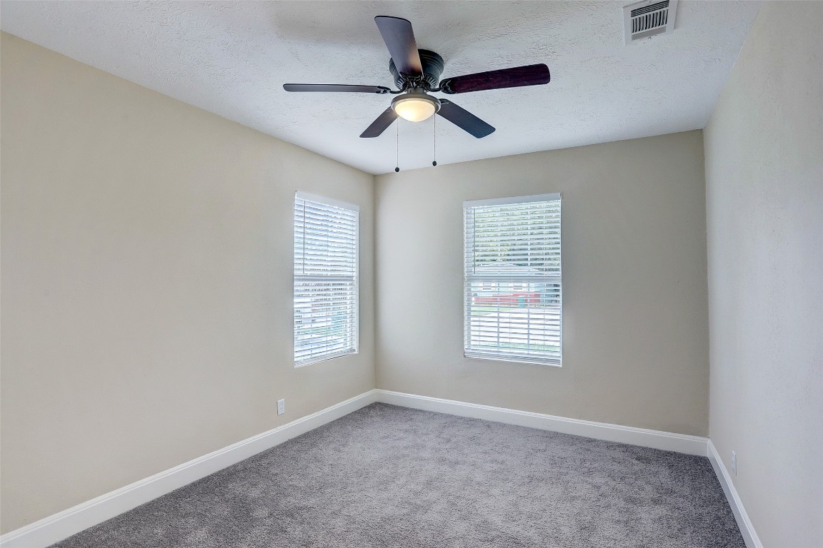 515 Main Street Pasadena, TX 77506 - Photo 5 of 10 a view of an empty room with a window