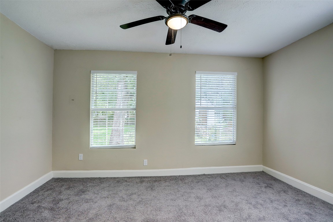 515 Main Street Pasadena, TX 77506 - Photo 7 of 10 a view of an empty room with a window