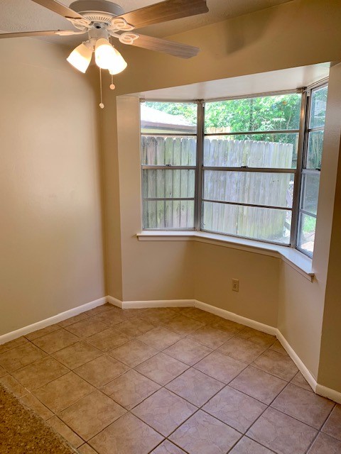 16215 Rill Lane Houston, TX 77062 - Photo 13 of 33 a view of an empty room with a window