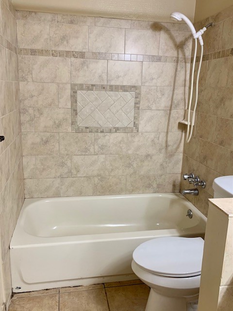 16215 Rill Lane Houston, TX 77062 - Photo 27 of 33 a white bath tub sitting next to a toilet