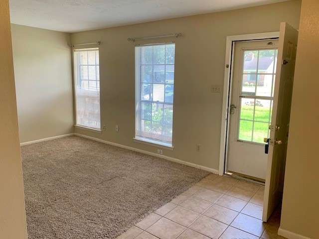 16215 Rill Lane Houston, TX 77062 - Photo 4 of 33 a view of an empty room with window and bathroom