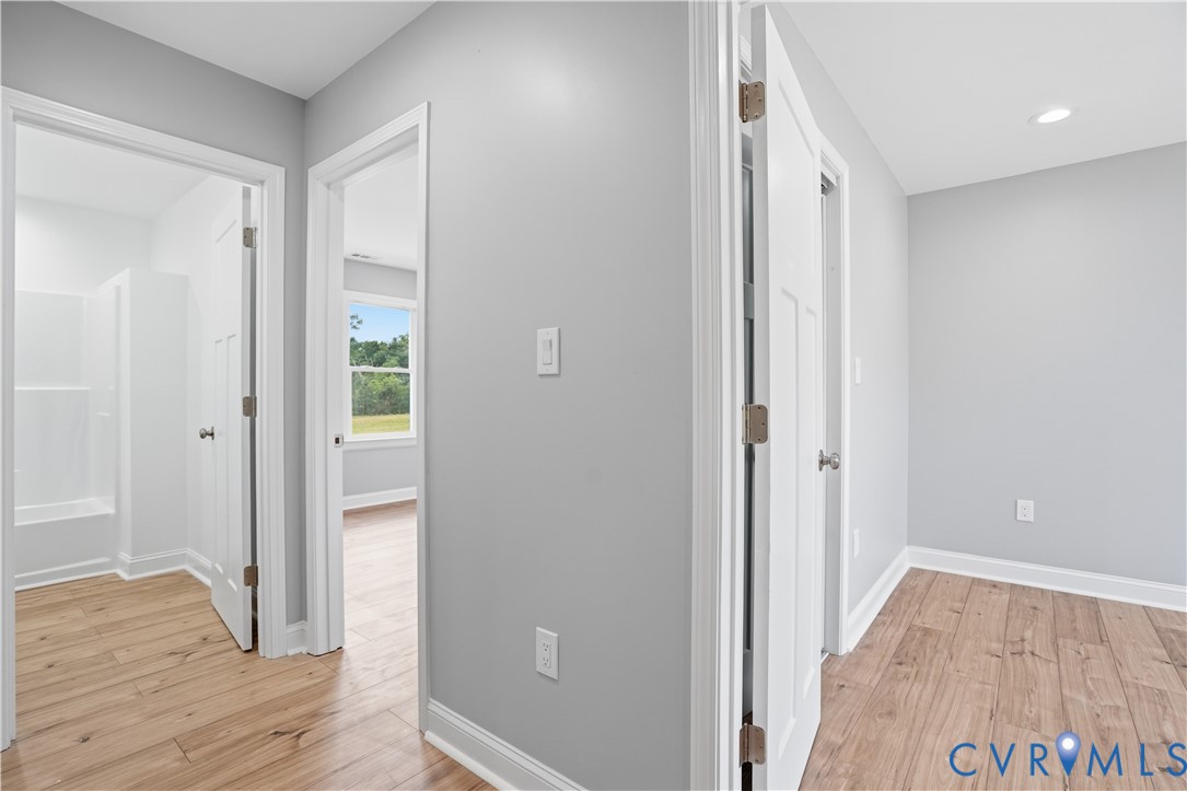 7839 King William Road Aylett, VA 23009 - Photo 25 of 38 a view of hallway with wooden floor