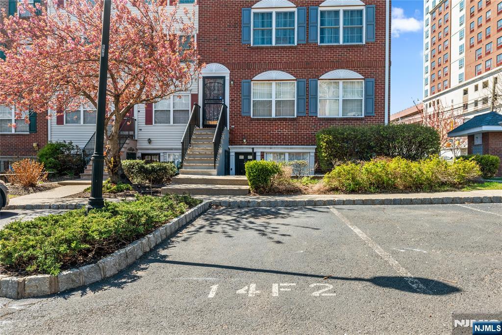 159 Market Street, Unit 1411 Newark, NJ 07102 - Photo 16 of 19 a front view of a multi story residential apartment buildings