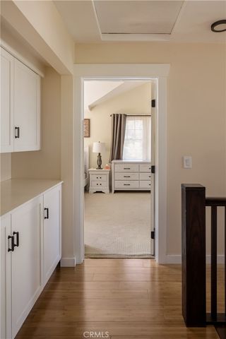 a view of kitchen and wooden floor