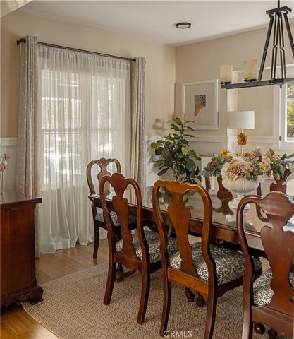 a bathroom with a granite countertop sink and a bathtub
