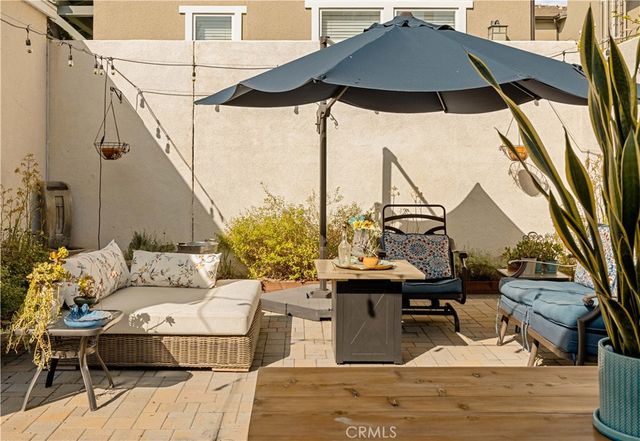 a front view of a house with patio