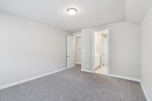 a bathroom with double sink and a mirror