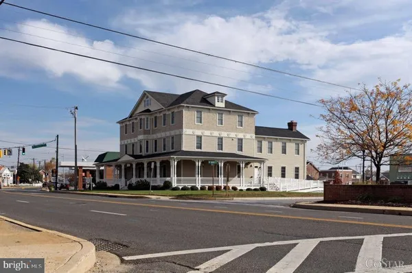 a view of a building with a street