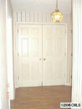 414 South Potter Road Lancaster, SC 29720 - Photo 5 of 8 a view of empty room with wooden floor and fan