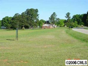 414 South Potter Road Lancaster, SC 29720 - Photo 8 of 8 a backyard of a house with lots of green space
