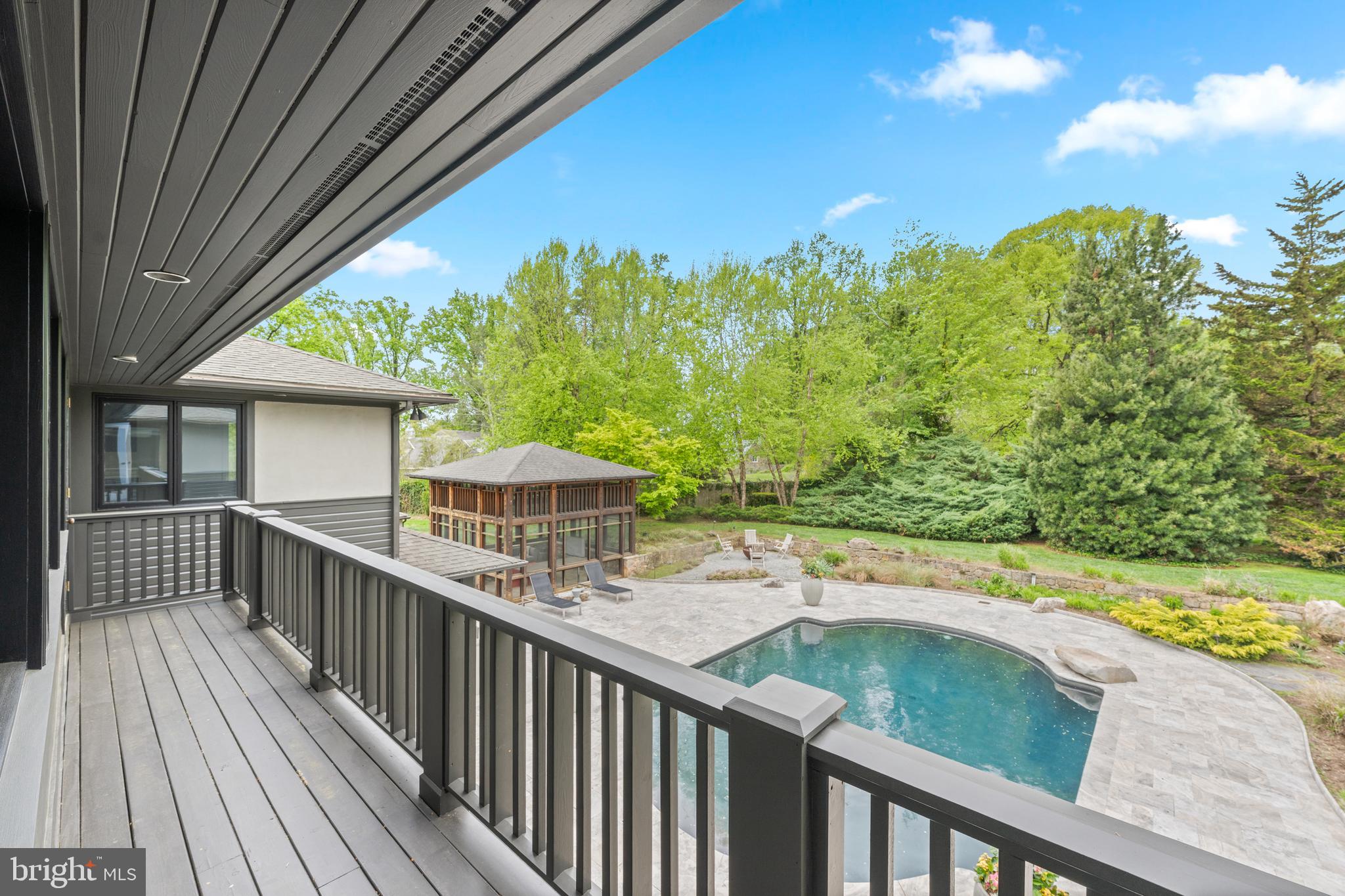 850 Lesley Road Villanova, PA 19085 - Photo 23 of 37 a view of a wooden deck and a yard