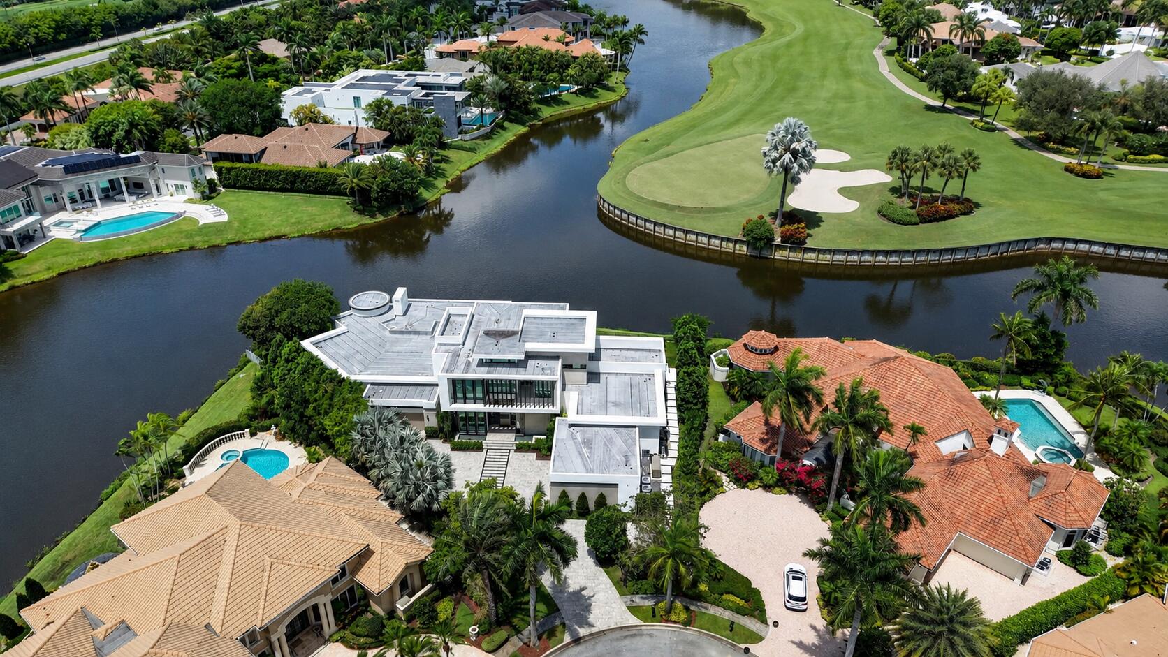 6960 Lake Estates Court Boca Raton, FL 33496 - Photo 54 of 58 an aerial view of a house with yard swimming pool and outdoor seating