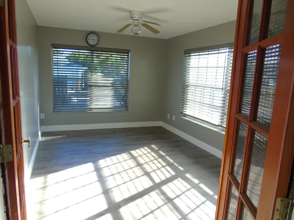 a view of an empty room and window