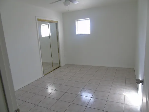 an empty room with a bathroom