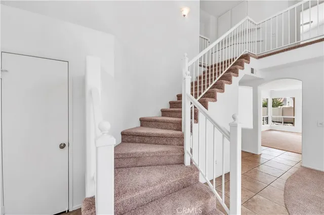 a view of entryway with stairs