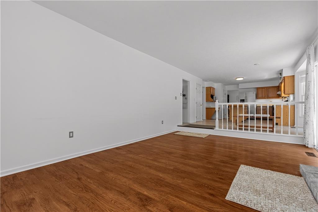 1626 Forest Ridge Drive Pittsburgh, PA 15237 - Photo 19 of 34 a view of a livingroom with wooden floor and pool
