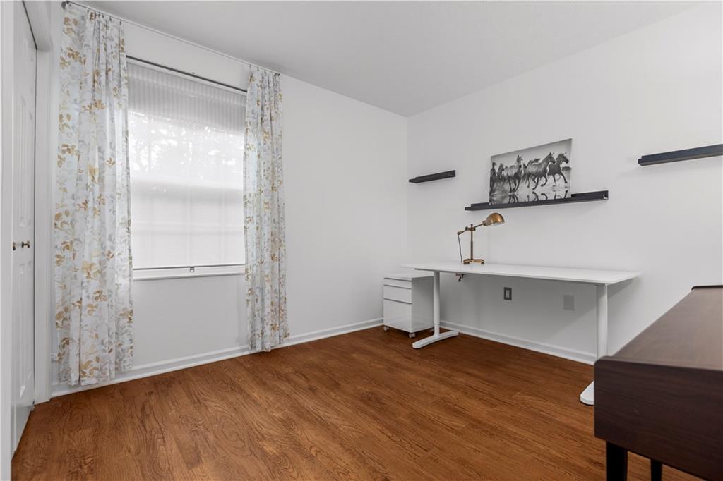 1626 Forest Ridge Drive Pittsburgh, PA 15237 - Photo 26 of 34 a view of a room with wooden floor and small window