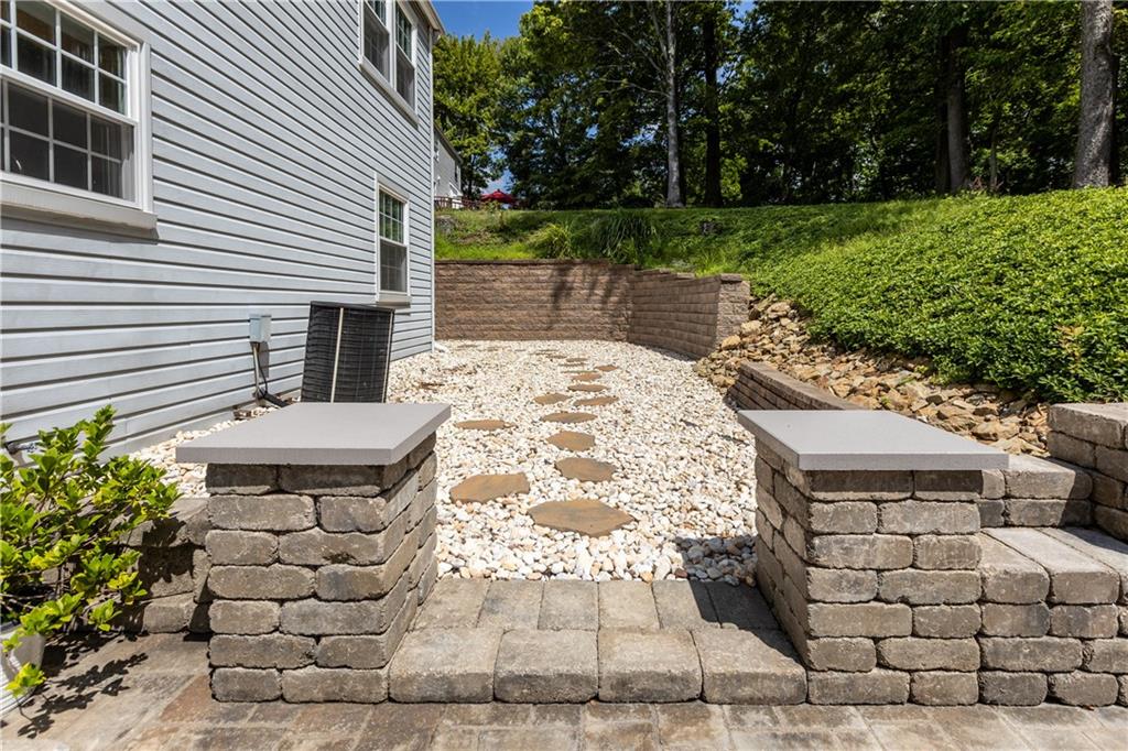 1626 Forest Ridge Drive Pittsburgh, PA 15237 - Photo 29 of 34 a wooden bench sitting in front of a house